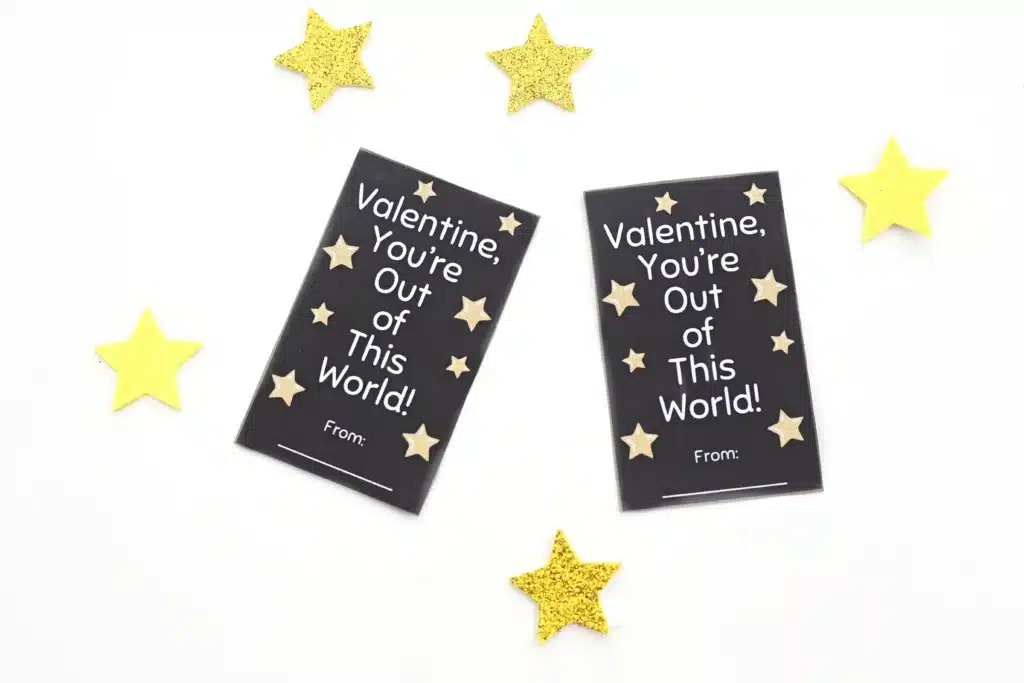 Printable Valentine You're Out of This World - Cultivating Brilliant Minds Printable Valentine that reads "Valentine, You're Out of This World" with foam stars around them