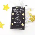 Printable Valentine You're Out of This World - Cultivating Brilliant Minds Printable valentines that read "valentine, you're out of this world" attached to a bag of foam stars