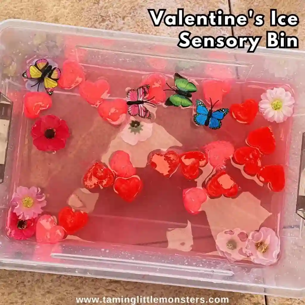 Heart-Themed Crafts For Kids This Valentine's Day - Cultivating Brilliant Minds a valentine's day sensory bin that has red ice cubes shaped like hearts in it
