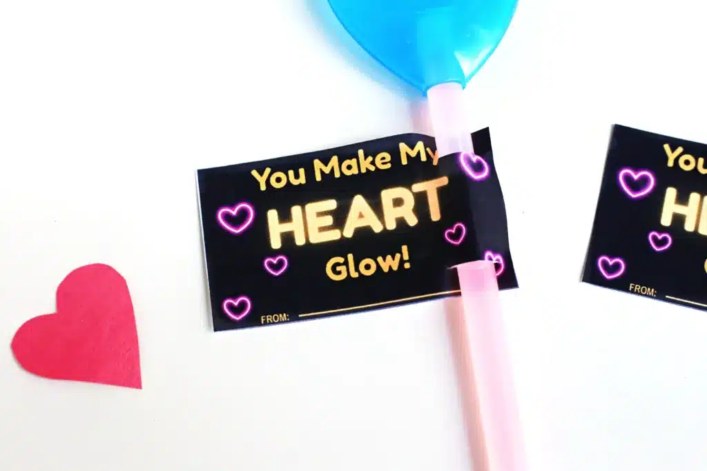 You Make My Heart Glow Valentine Card - Cultivating Brilliant Minds a printable valentine card that says " you make my heart glow" with heart and butterfly glow sticks attached