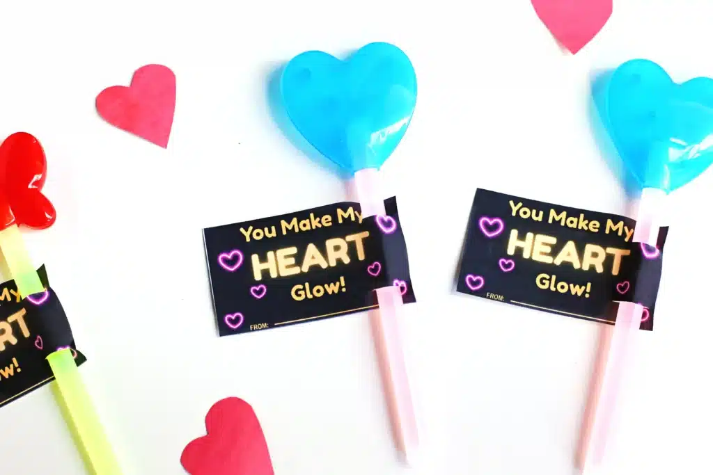 You Make My Heart Glow Valentine Card - Cultivating Brilliant Minds a printable valentine card that says " you make my heart glow" with heart and butterfly glow sticks attached