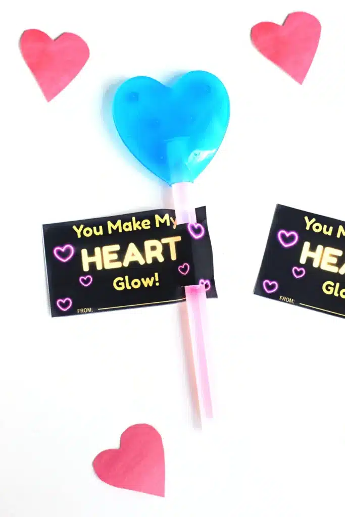 You Make My Heart Glow Valentine Card - Cultivating Brilliant Minds a printable valentine card that says " you make my heart glow" with heart and butterfly glow sticks attached
