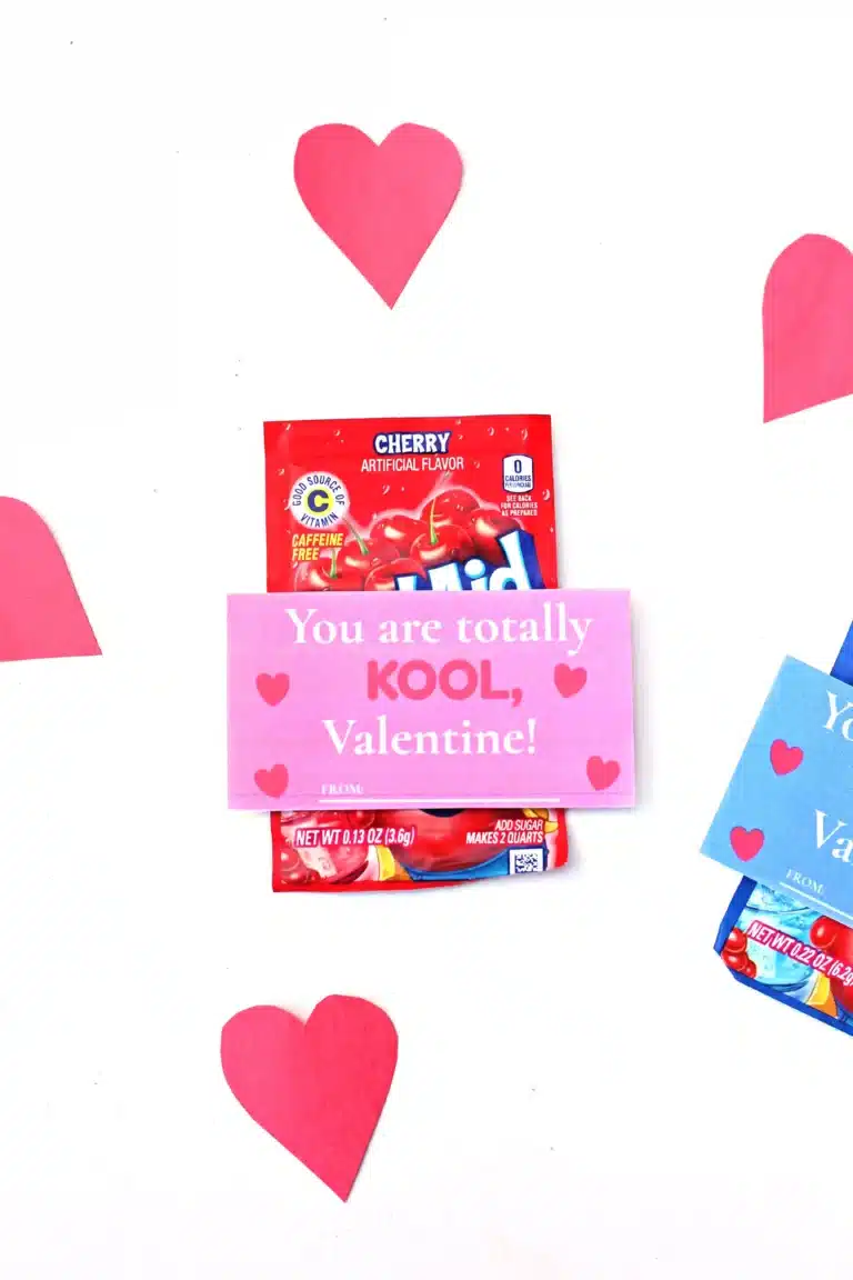 printable valentines that read "Valentine, you are totally kool" attached to a packet of kool aid