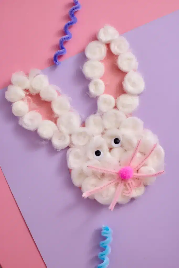 Cotton Ball Bunny Craft - Cultivating Brilliant Minds a cotton ball bunny craft that has cotton balls glued on a bunny cut out of construction paper