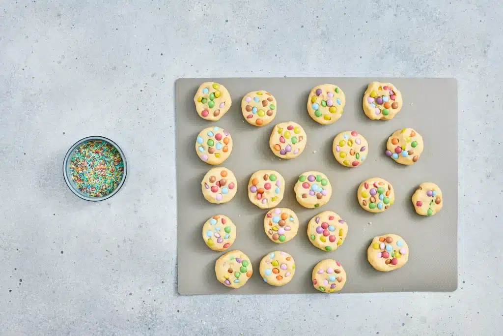 Chewy Easter Cookies - Cultivating Brilliant Minds cookie batter rolled into balls on a baking mat