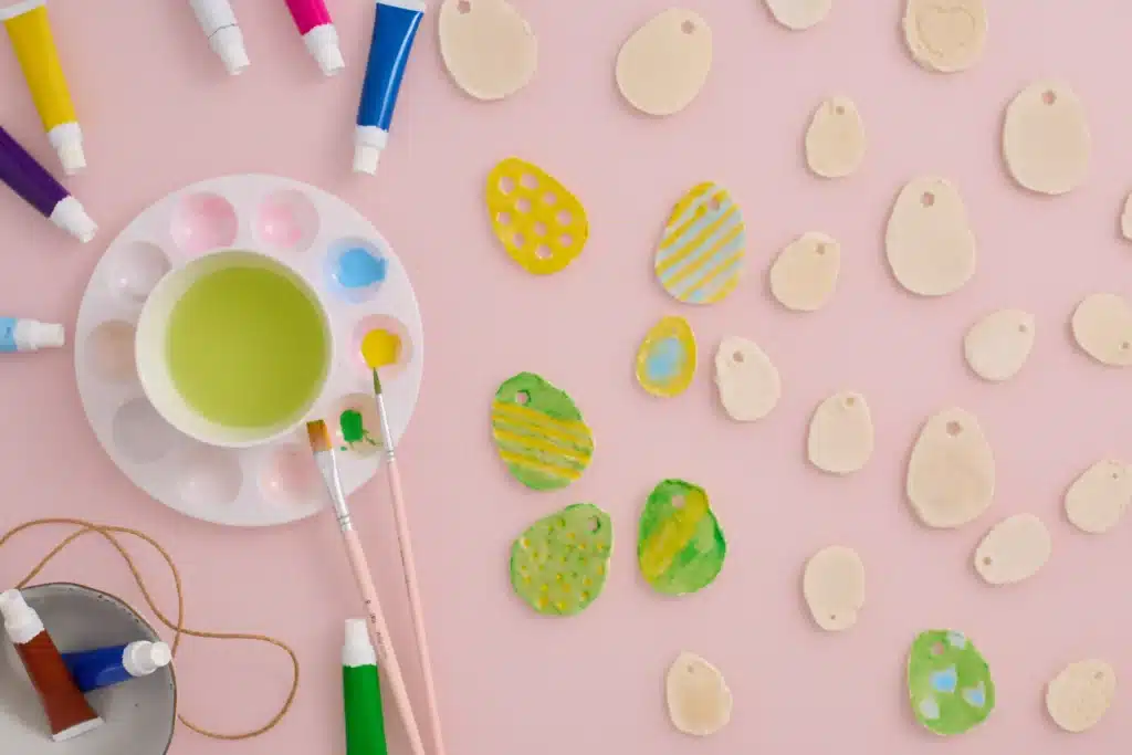 Easter Egg Salt Dough Ornaments For Kids - Cultivating Brilliant Minds salt dough cut into ovals and decorated to look like Easter eggs