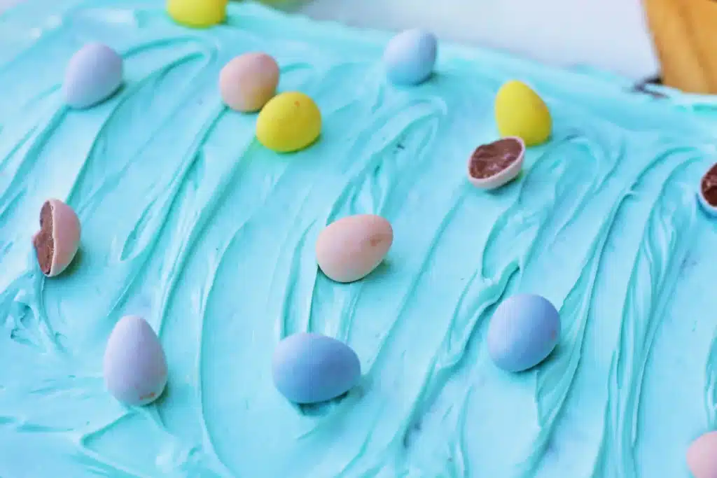 Robin Egg Brownies - Cultivating Brilliant Minds brownies with blue icing and mini cadbury eggs