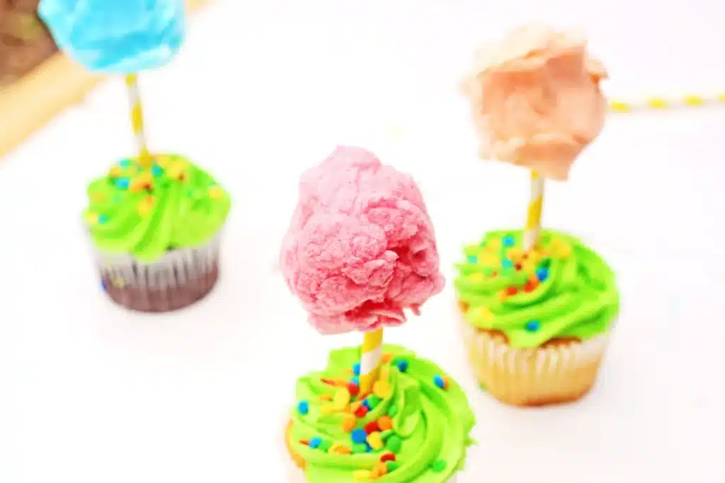 Truffula Tree Cupcakes - Cultivating Brilliant Minds truffula tree cupcakes that are cupcakes with a straw in them that have cotton candy attached to the top