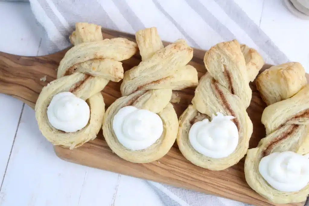 Cinnamon Sugar Bunny Twists - Cultivating Brilliant Minds cinnamon and sugar pastries that are twisted to look like a bunny with icing as a cotton tail