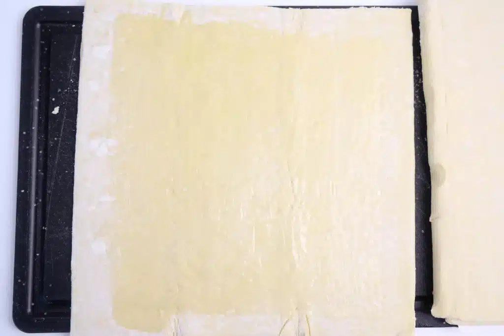 Cinnamon Sugar Bunny Twists - Cultivating Brilliant Minds puff pastry with melted butter spread on top