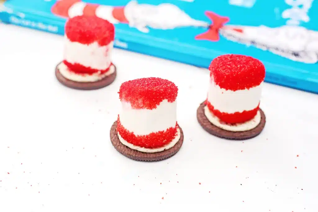 Cat in the Hat Cookies - Cultivating Brilliant Minds cat in the hat cookies that use an oreo cookie, marshmallow, and red sanding sugar to look like the cat in the hat's hat