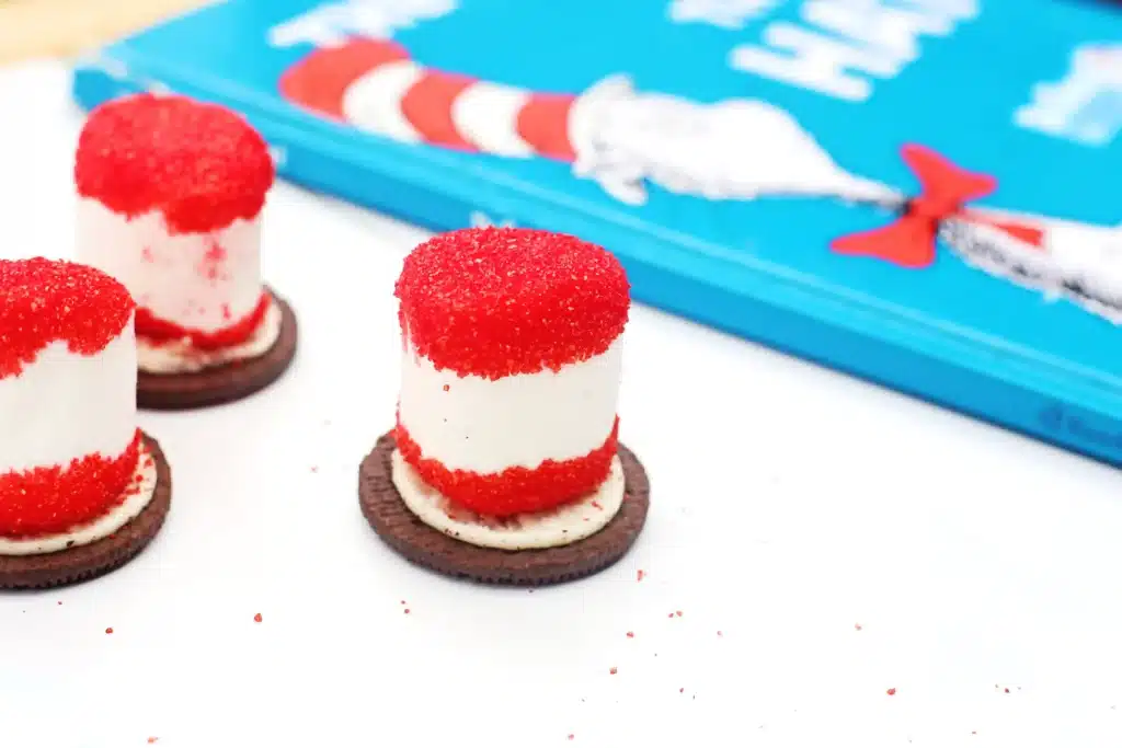 Cat in the Hat Cookies - Cultivating Brilliant Minds cat in the hat cookies that use an oreo cookie, marshmallow, and red sanding sugar to look like the cat in the hat's hat