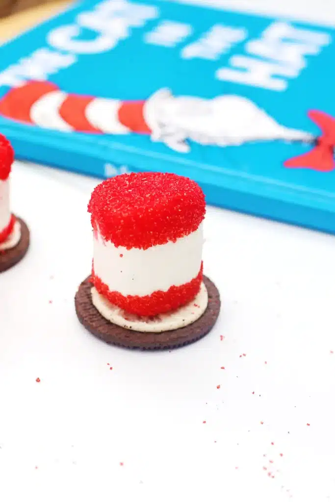 Cat in the Hat Cookies - Cultivating Brilliant Minds cat in the hat cookies that use an oreo cookie, marshmallow, and red sanding sugar to look like the cat in the hat's hat