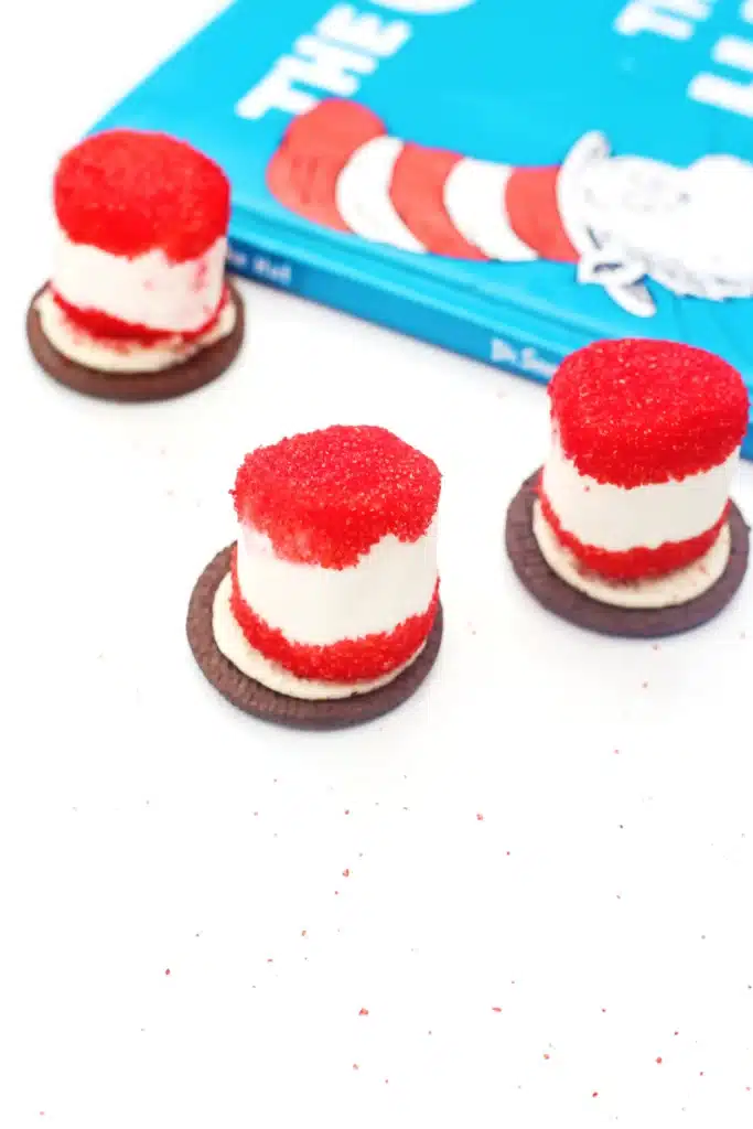 Cat in the Hat Cookies - Cultivating Brilliant Minds cat in the hat cookies that use an oreo cookie, marshmallow, and red sanding sugar to look like the cat in the hat's hat