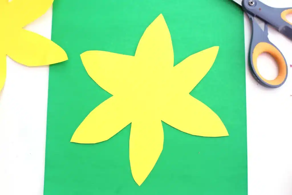 Cupcake Liner Daffodil - Cultivating Brilliant Minds a flower cut out of yellow construction paper