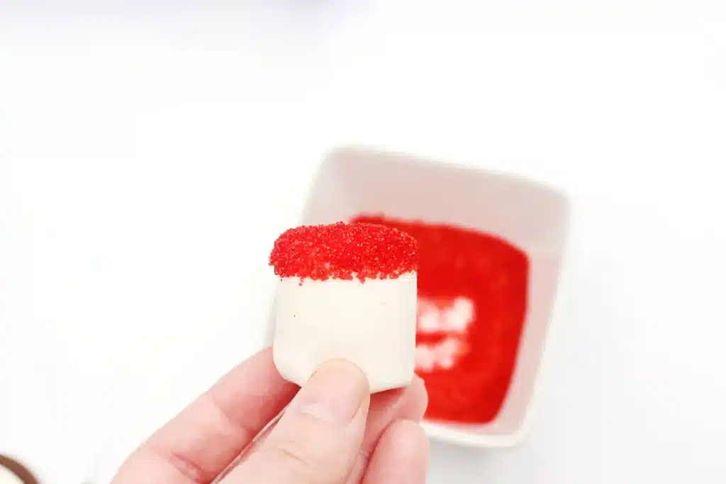 Cat in the Hat Cookies - Cultivating Brilliant Minds a marshmallow dipped in red sanding sugar