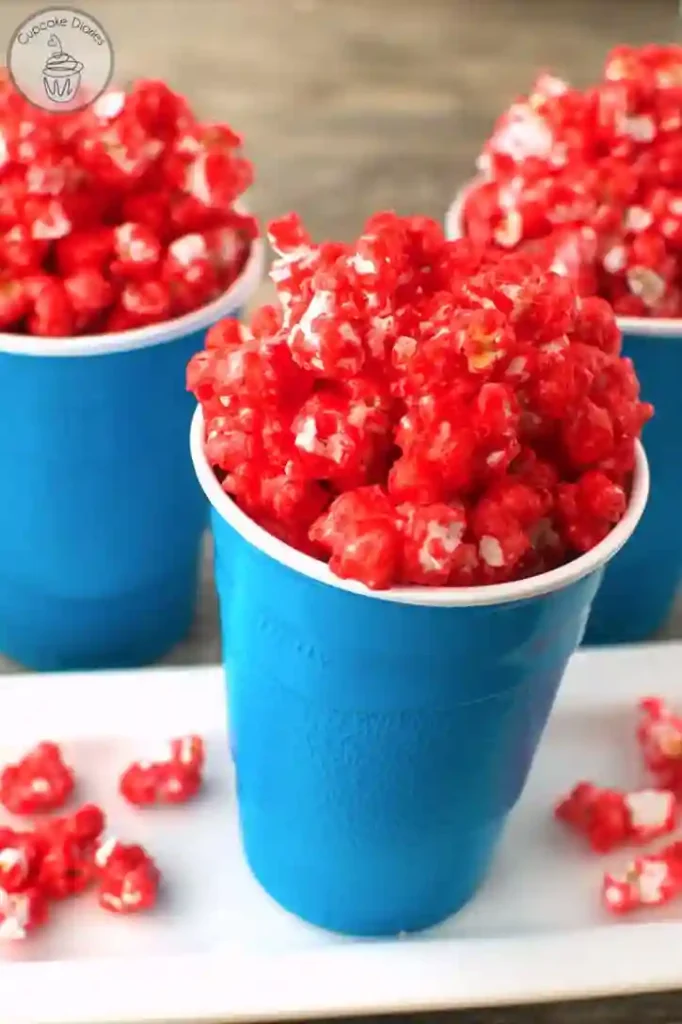Dr. Seuss Inspired Treats - Cultivating Brilliant Minds red popcorn in a blue cup