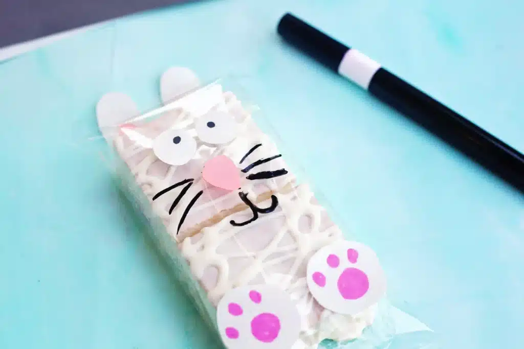 Little Debbie Easter Bunny Cakes - Cultivating Brilliant Minds Little Debbie Easter Bunny Cakes that have construction paper bunny faces, feet, and ears glued onto the wrapper