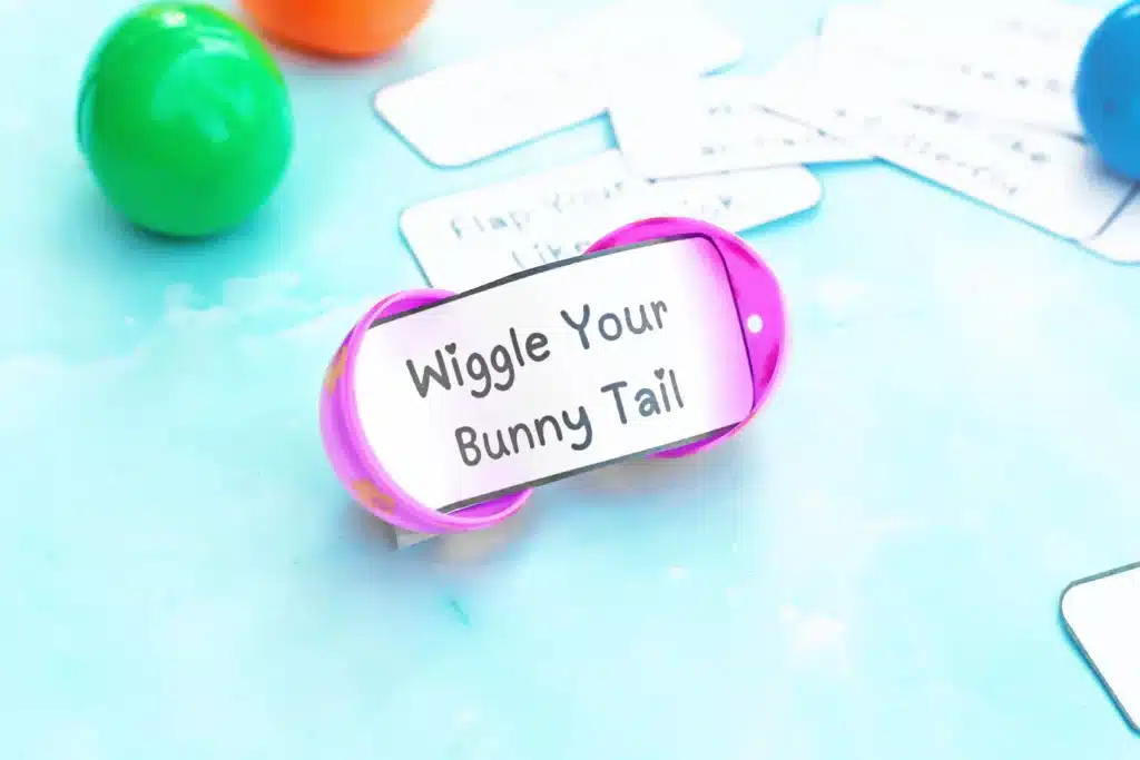 Easter Egg Hunt Movement Game - Cultivating Brilliant Minds an easter egg hunt movement game that has a strip of paper inside the egg that says "wiggle your bunny tail"