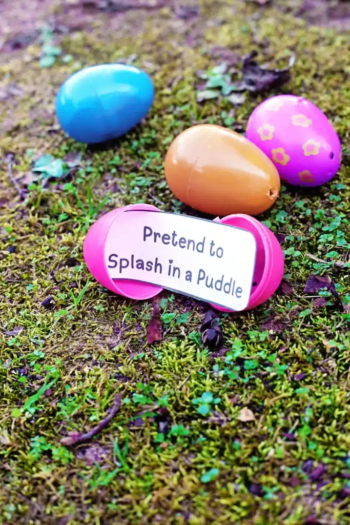 Easter Egg Hunt Movement Game - Cultivating Brilliant Minds an easter egg hunt movement game that has a strip of paper inside the egg that says "pretend to splash in a puddle"