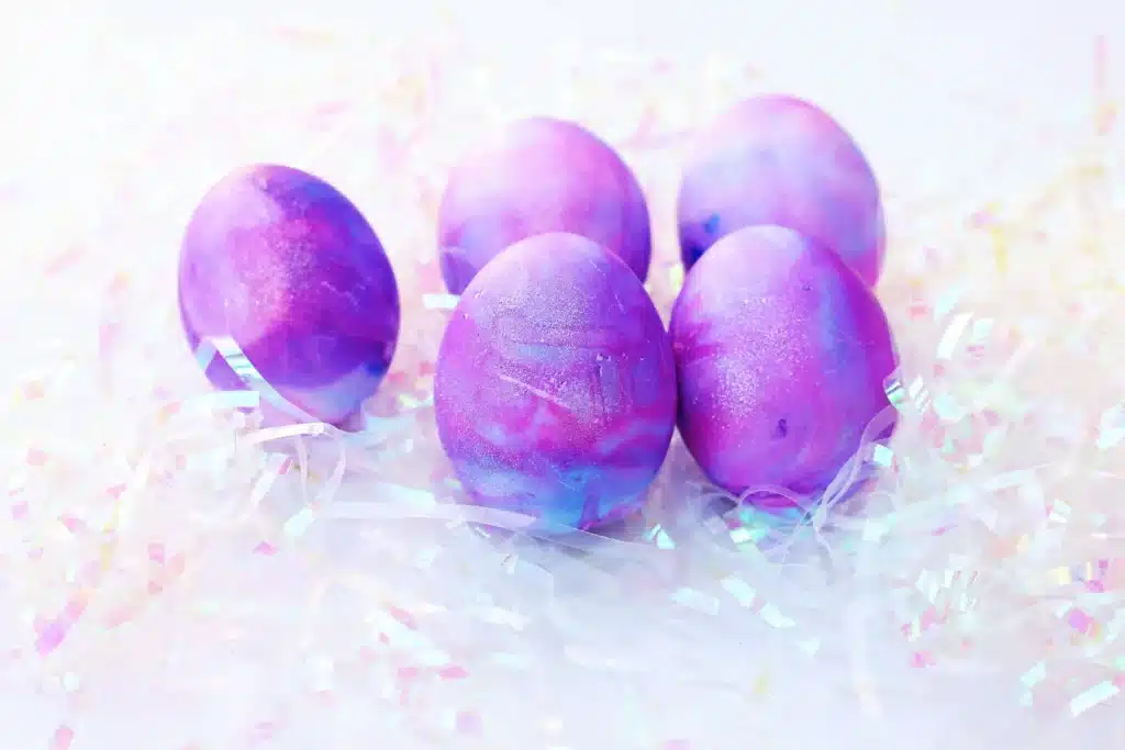 Galaxy Easter Eggs - Cultivating Brilliant Minds easter eggs dyed to look like a galaxy with gold glitter