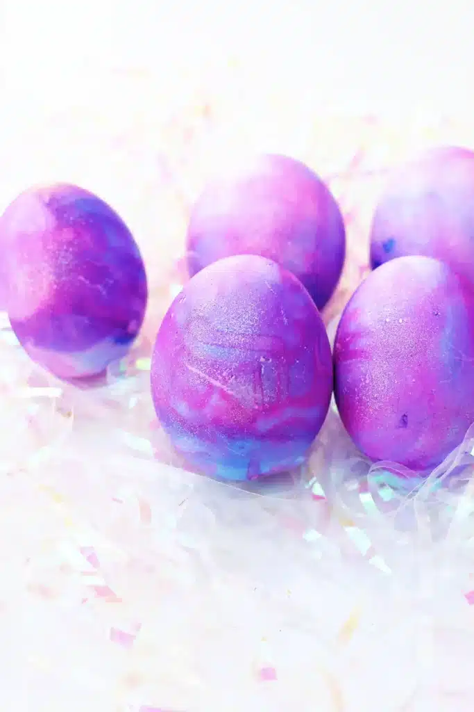 Galaxy Easter Eggs - Cultivating Brilliant Minds easter eggs dyed to look like a galaxy with gold glitter