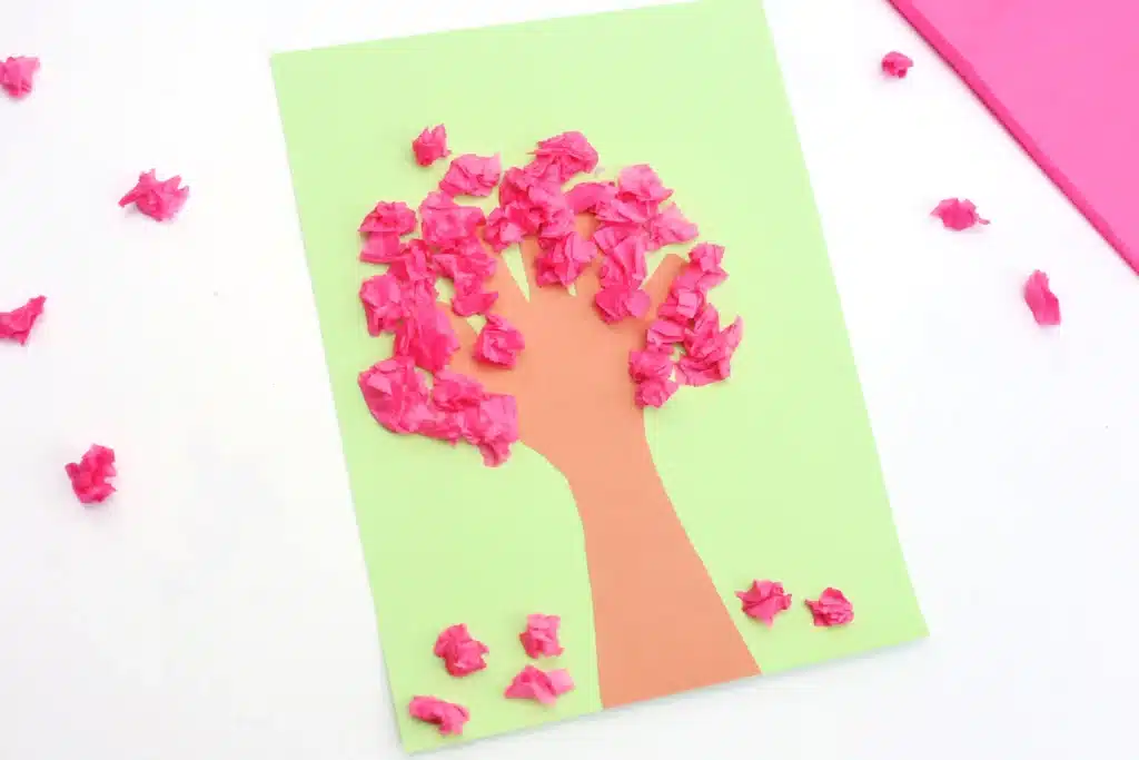 Handprint Cherry Blossom Tree - Cultivating Brilliant Minds a handprint cherry blossom tree that uses a handprint as the trunk and crumbled pink tissue paper as the cherry blossoms