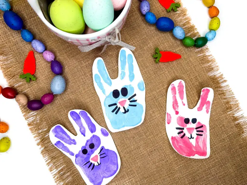 Bunny Handprint Craft For Easter - Cultivating Brilliant Minds a bunny handprint craft that uses a handprint with a drawn on face to look like a bunny
