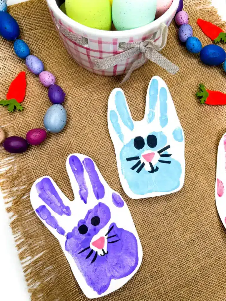 Bunny Handprint Craft For Easter - Cultivating Brilliant Minds a bunny handprint craft that uses a handprint with a drawn on face to look like a bunny