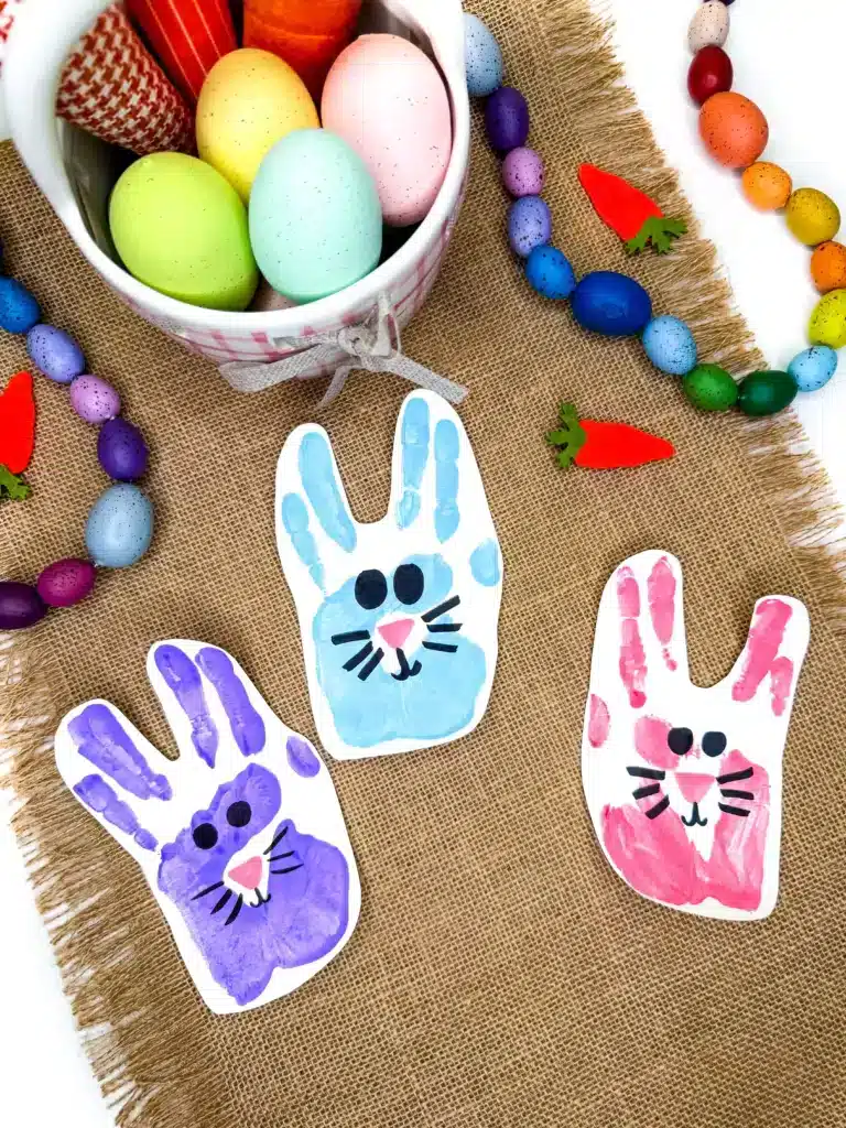 Bunny Handprint Craft For Easter - Cultivating Brilliant Minds handprints turned into bunnies with markers