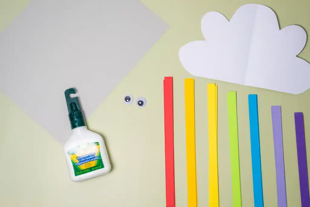Rainbow Cloud Craft - Cultivating Brilliant Minds construciton paper, glue, googly eyes, strips of colored paper