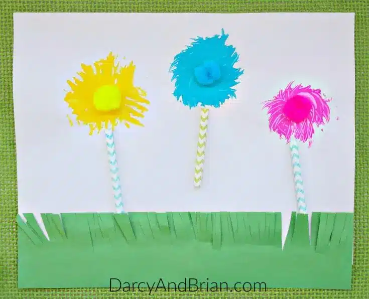 Dr Seuss Crafts for Kids - Cultivating Brilliant Minds a painting of truffula trees made with a fork and straws for the trunk