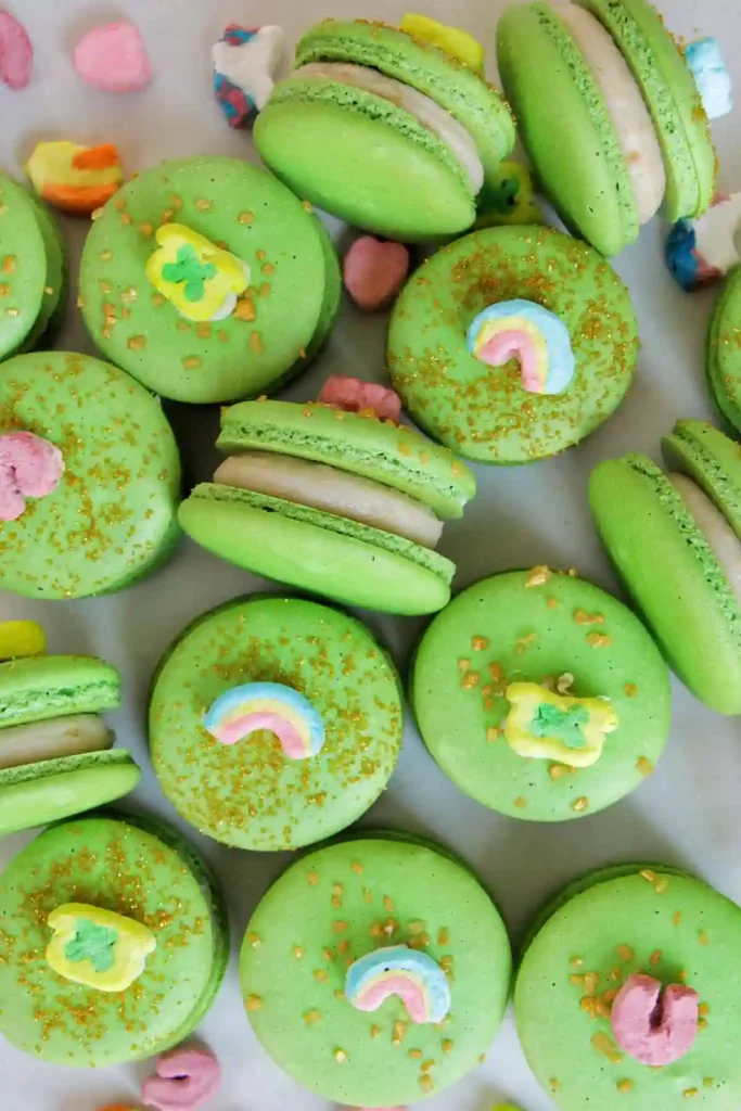 St. Patrick's Day Treats for Kids - Cultivating Brilliant Minds green macaroons with lucky charms marshmallows on top