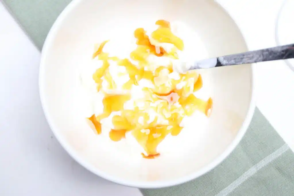 Lucky Charms Yogurt Clovers-6 - Cultivating Brilliant Minds honey and yogurt in a bowl