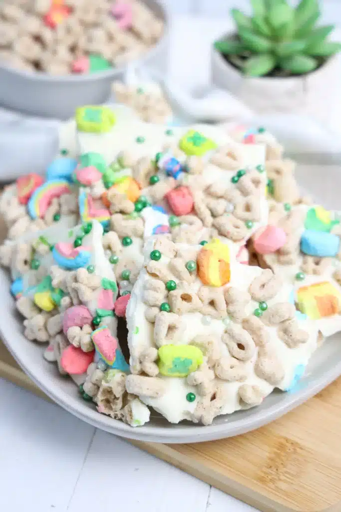 Lucky Charms Bark for St. Patrick's Day - Cultivating Brilliant Minds lucky charms bark with white chocolate, lucky charms cereal, and green sprinkles