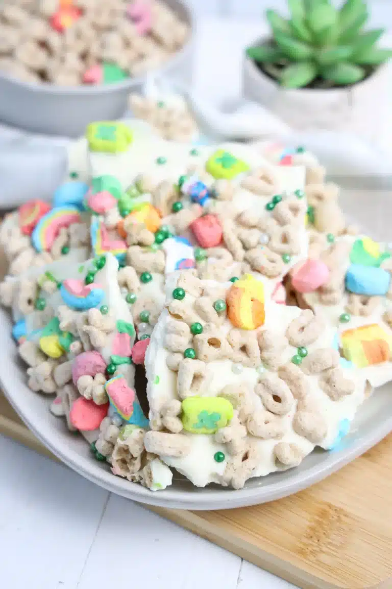lucky charms bark with white chocolate, lucky charms cereal, and green sprinkles