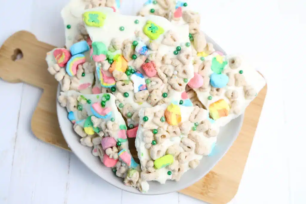 Lucky Charms Bark for St. Patrick's Day - Cultivating Brilliant Minds lucky charms bark with white chocolate, lucky charms cereal, and green sprinkles