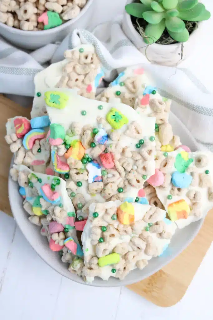 Lucky Charms Bark for St. Patrick's Day - Cultivating Brilliant Minds lucky charms bark with white chocolate, lucky charms cereal, and green sprinkles