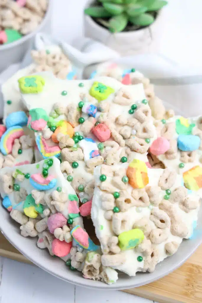 Lucky Charms Bark for St. Patrick's Day - Cultivating Brilliant Minds lucky charms bark with white chocolate, lucky charms cereal, and green sprinkles