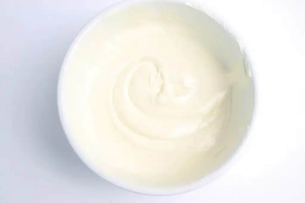 Lucky Charms Bark for St. Patrick's Day - Cultivating Brilliant Minds melted white chocolate in a bowl