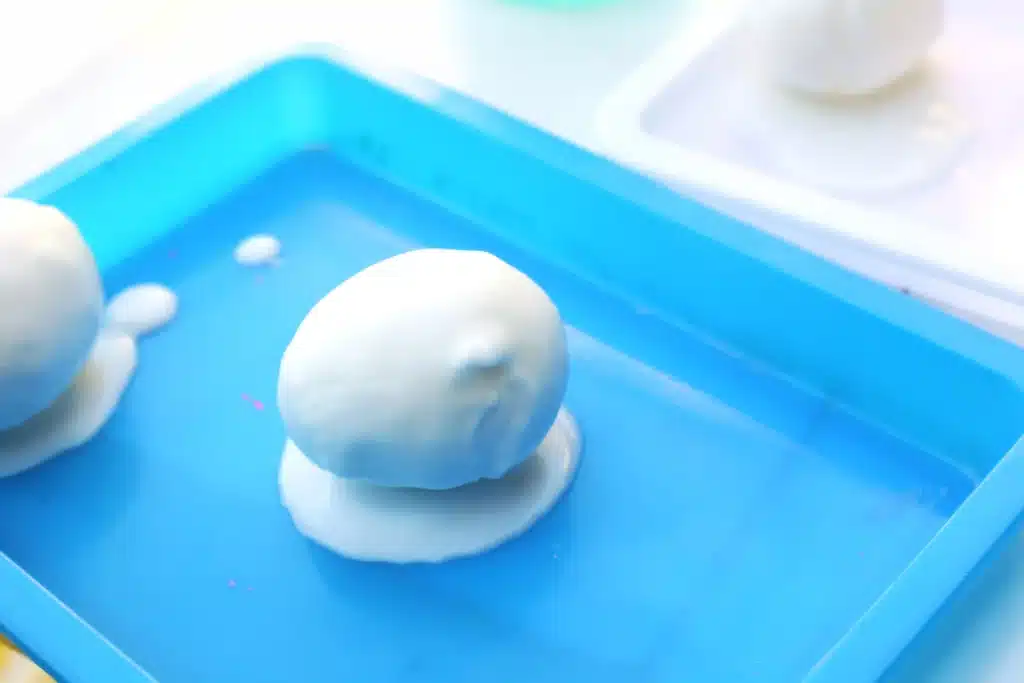 Galaxy Easter Eggs - Cultivating Brilliant Minds an egg covered in baking soda paste