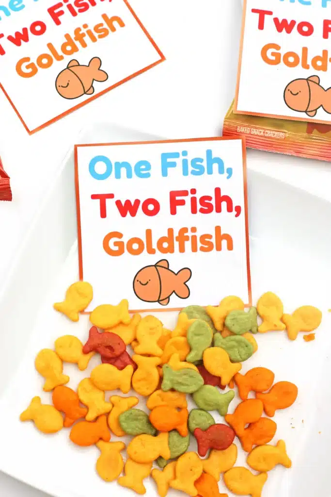 Dr. Seuss One Fish Two Fish Goldfish Printable - Cultivating Brilliant Minds goldfish with a printable sign on it that says "one fish, two fish, goldfish"