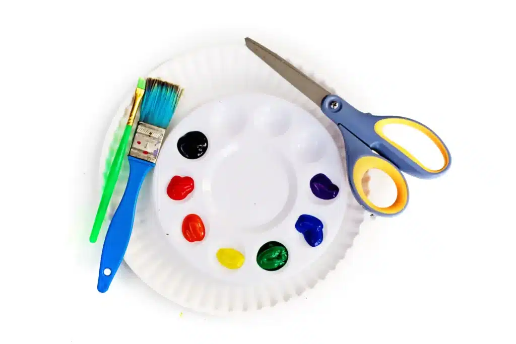 Paper Plate Pot of Gold with Fingerprint Coins - Cultivating Brilliant Minds paint, paintbrush, paper plate, and scissors