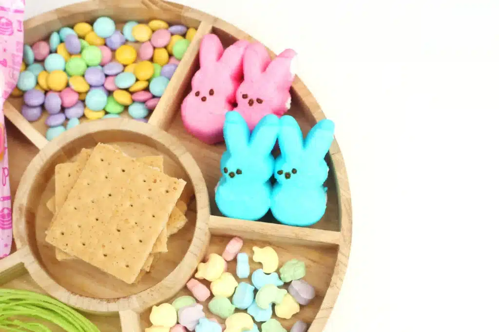 Peeps House STEM Challenge - Cultivating Brilliant Minds peeps, graham crackers, icing, edible easter grass, pastel m&ms, and easter sprinkles