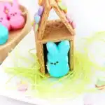 Peeps House STEM Challenge - Cultivating Brilliant Minds a Peeps House STEM Challenge that uses graham crackers, icing, and m&ms to build a house for a peeps bunny