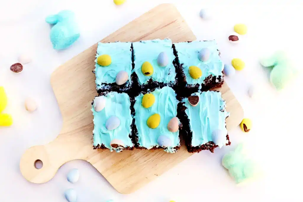Robin Egg Brownies - Cultivating Brilliant Minds brownies with blue icing and mini cadbury eggs
