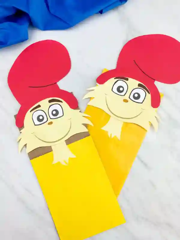 Dr Seuss Crafts for Kids - Cultivating Brilliant Minds a puppet craft of Sam I Am from Dr. Seuss's book "Green Eggs and Ham"