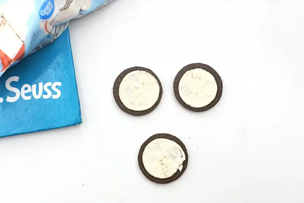 Cat in the Hat Cookies - Cultivating Brilliant Minds halves of oreo cookies