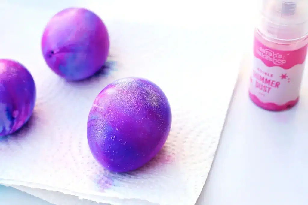 Galaxy Easter Eggs - Cultivating Brilliant Minds eggs decorated to look like a galaxy with edible glitter on top