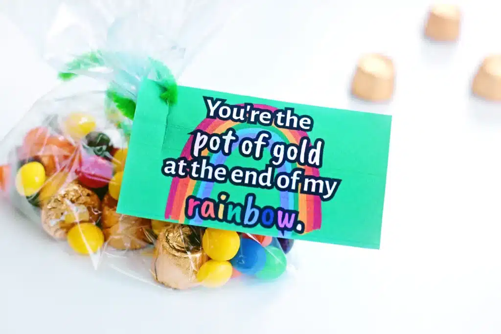 St Patrick's Day Favor Tags - Cultivating Brilliant Minds a bag of candy with a tag attached that says "You're the pot of gold at the end of my rainbow"
